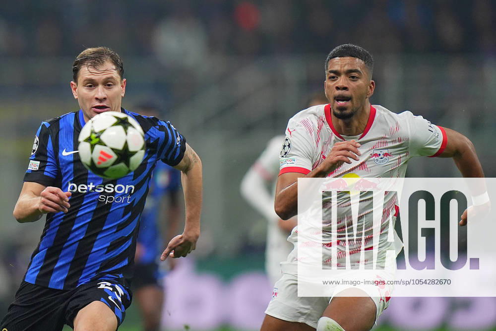 Inter Milan s Nicolo Barella fights for the ball with Leipzig s Benjamin Henrichs during the Uefa Champions League soccer match between Inter and Leipzig at the San Siro Stadium in Milan, north Italy - Tuesday , November 26 , 2024. - Soccer .