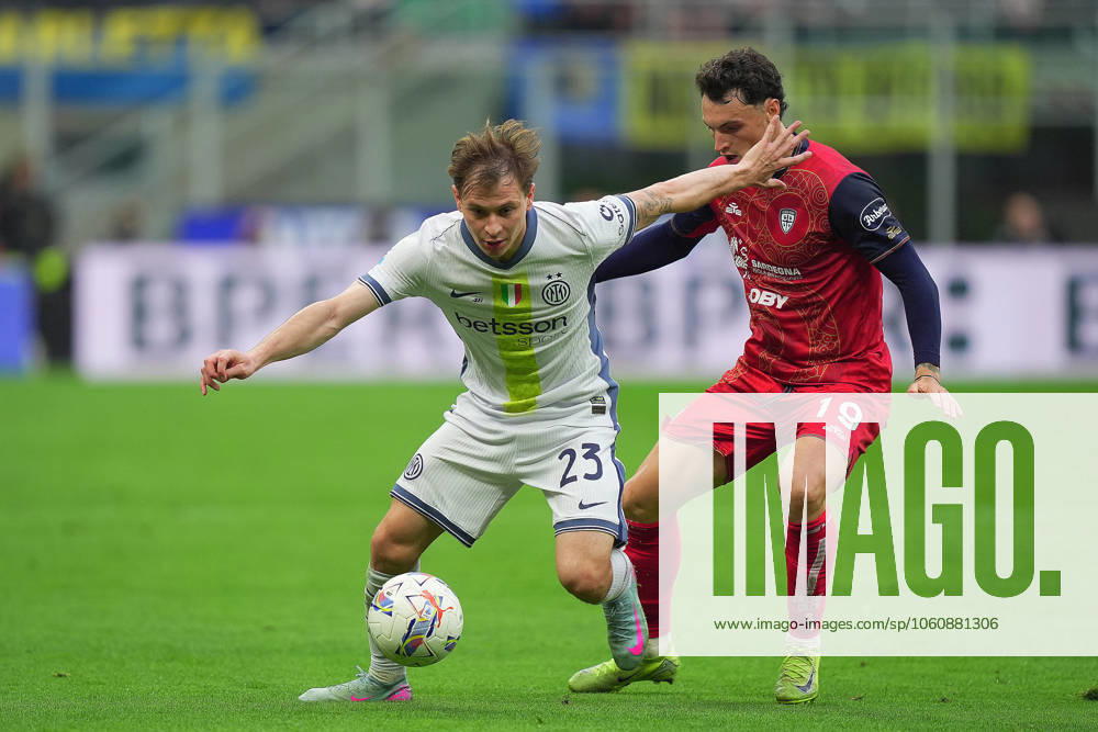 Inter MilanÕs Nicolo Barella fights for the balll with Cagliari s Nadir Zortea during the Serie A soccer match between Inter and Cagliari at San Siro Stadium in Milan , North Italy - Saturday , April 12 , 2025 . - Soccer .