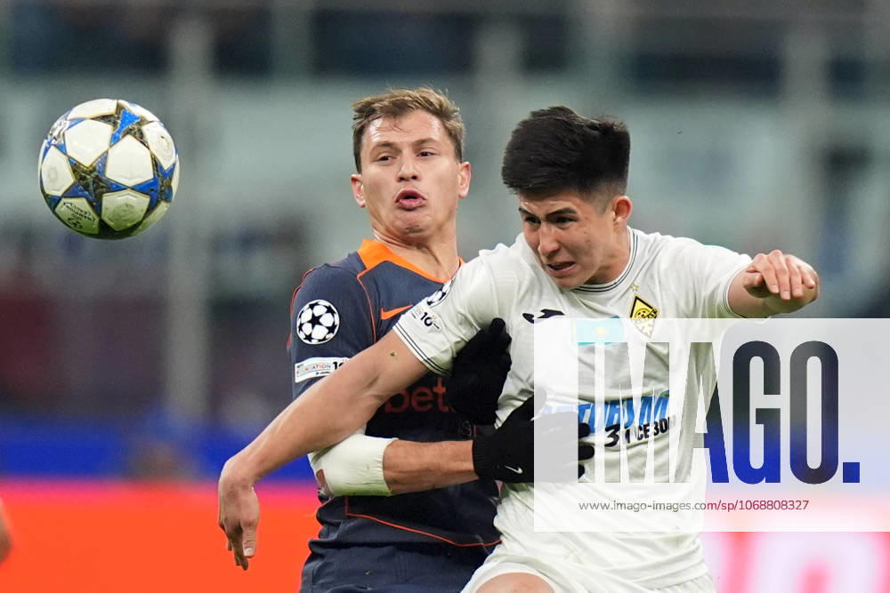 Inter Milans Nicolo Barella fights for the ball with Kairat s Dastan Satpayev during the Uefa Champions League soccer match between Inter and Kairat at the San Siro Stadium in Milan , north Italy - Wednesday , November 5 , 2025. - Soccer .