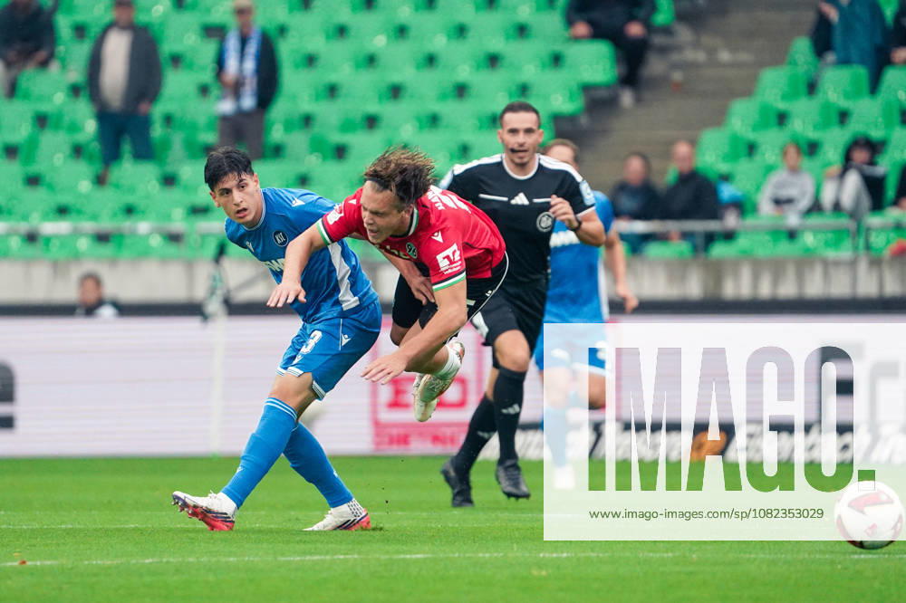 Deutschland: Fussball 2.Bundesliga 2026 2027, 4. Spieltag - Hannover 96 vs Karlsruher SC - Heinz von Heiden Arena Stadion (Hannover): im Zweikampf Lars Gindorf (Hannover 96, 25) Deniz Ofli (Karlsruher SC, 3)