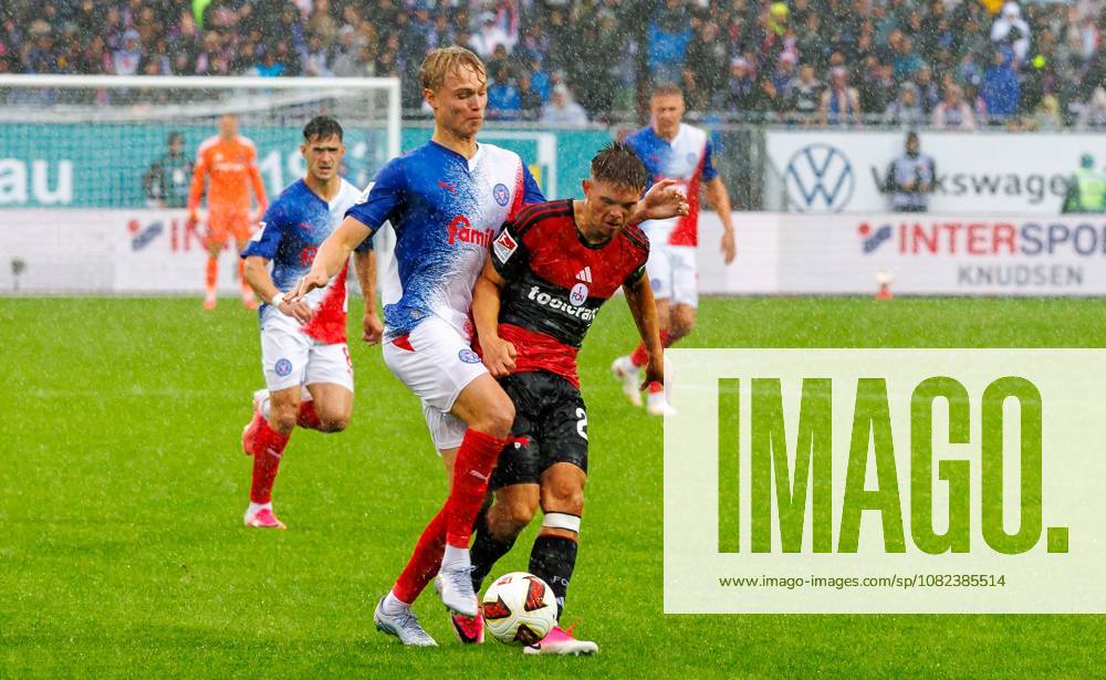 Fussball - Saison 2026 2027 - 2. Fussball - Bundesliga - 04. Spieltag: Holstein Kiel KSV Kieler Sportvereinigung Holstein von 1900 ( Störche ) - 1. FC Nürnberg FCN ( Club ) - Sportfoto Zink DaMa - - DFL regulations prohibit any use of photographs as image sequences and or quasi-video - only for editorial use - Finn Ole Becker (22, 1. FC Nürnberg FCN, rechts ) im Angriff