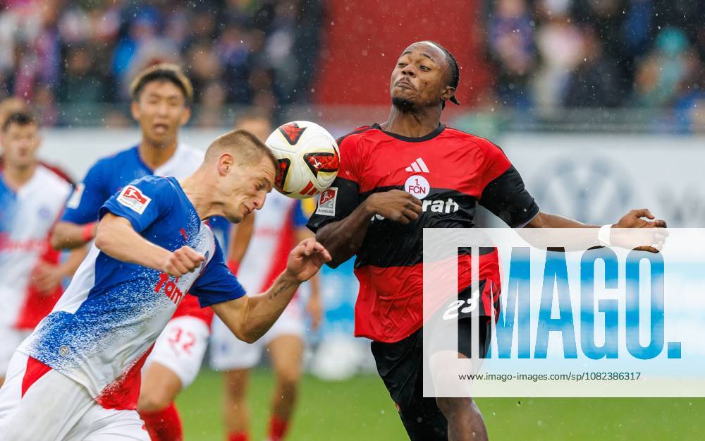 Fussball - Saison 2026 2027 - 2. Fussball - Bundesliga - 04. Spieltag: Holstein Kiel KSV Kieler Sportvereinigung Holstein von 1900 ( Störche ) - 1. FC Nürnberg FCN ( Club ) - Sportfoto Zink DaMa - - DFL regulations prohibit any use of photographs as image sequences and or quasi-video - only for editorial use - Ivan Nekic (13, Holstein Kiel ) Mohamed Ali Zoma (23, 1. FC Nürnberg FCN )