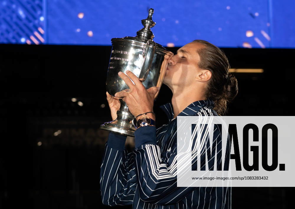 2026 US Open - Day 15 NEW YORK, NEW YORK - SEPTEMBER 13: Alexander Zverev of Germany poses with the trophy in front of the Arthur Ashe Stadium after winning the mens singles final against Ben Shelton of the United States (not pictured) during the 2026 US Open - Day 15 at USTA Billie Jean King National Tennis Center on September 13, 2026 in New York, New York. New York USTA Billie Jean King National Tennis Center New York United States