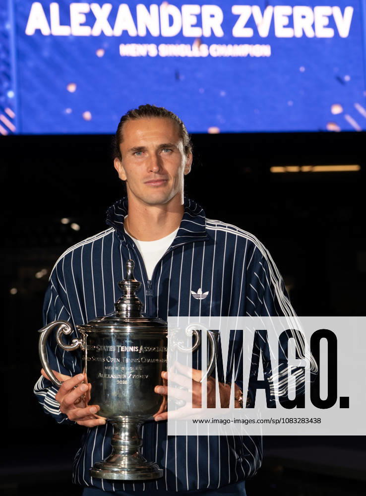 2026 US Open - Day 15 NEW YORK, NEW YORK - SEPTEMBER 13: Alexander Zverev of Germany poses with the trophy in front of the Arthur Ashe Stadium after winning the mens singles final against Ben Shelton of the United States (not pictured) during the 2026 US Open - Day 15 at USTA Billie Jean King National Tennis Center on September 13, 2026 in New York, New York. New York USTA Billie Jean King National Tennis Center New York United States