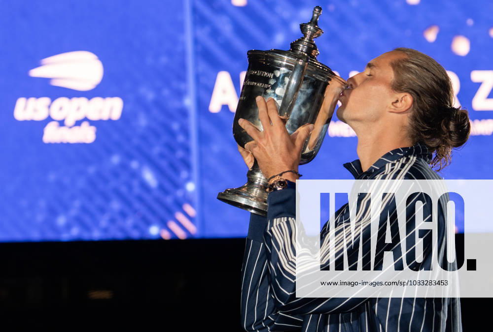 2026 US Open - Day 15 NEW YORK, NEW YORK - SEPTEMBER 13: Alexander Zverev of Germany poses with the trophy in front of the Arthur Ashe Stadium after winning the mens singles final against Ben Shelton of the United States (not pictured) during the 2026 US Open - Day 15 at USTA Billie Jean King National Tennis Center on September 13, 2026 in New York, New York. New York USTA Billie Jean King National Tennis Center New York United States