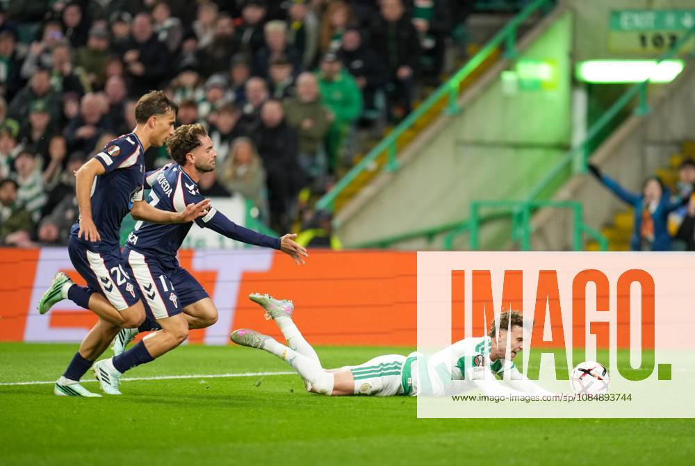 Callum Osmand of Celtic goes to ground under pressure from Sebastian Caceres & Javier Rueda of Celta Vigo Celtic v Celta Vigo, UEFA Europa League, Football, Celtic Park, Glasgow, Scotland, UK - 22 Oct 2026Glasgow Celtic Park Scotland United Kingdom