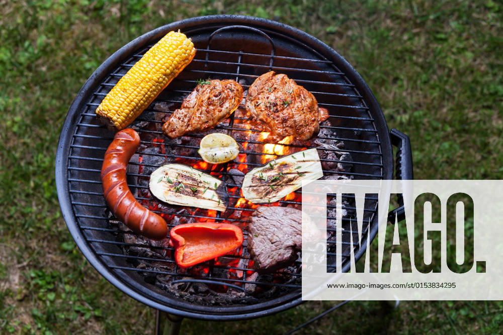 Overview of a bbq, model released, , property released, , 33395478.jpg, barbeque, zucchini, courgette, pepper, corn, barbecue, black, overview, hot, background, bbq, flame, roasted, meat, juicy, meal, food, dinner, menu, smoke, close up, roast, cooking, grilled, dark, flat, top, summer, steak, heat, closeup, grilling, delicious, grill, grass, flank, lay, overhead, pork, bone, cookout, outside, glowing, glow, beef, red, fire, grate,