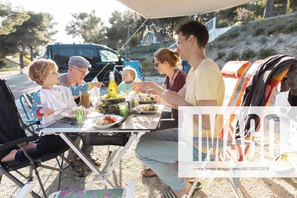 Theme family with grandfather at camping Seget Vranjica Croatia