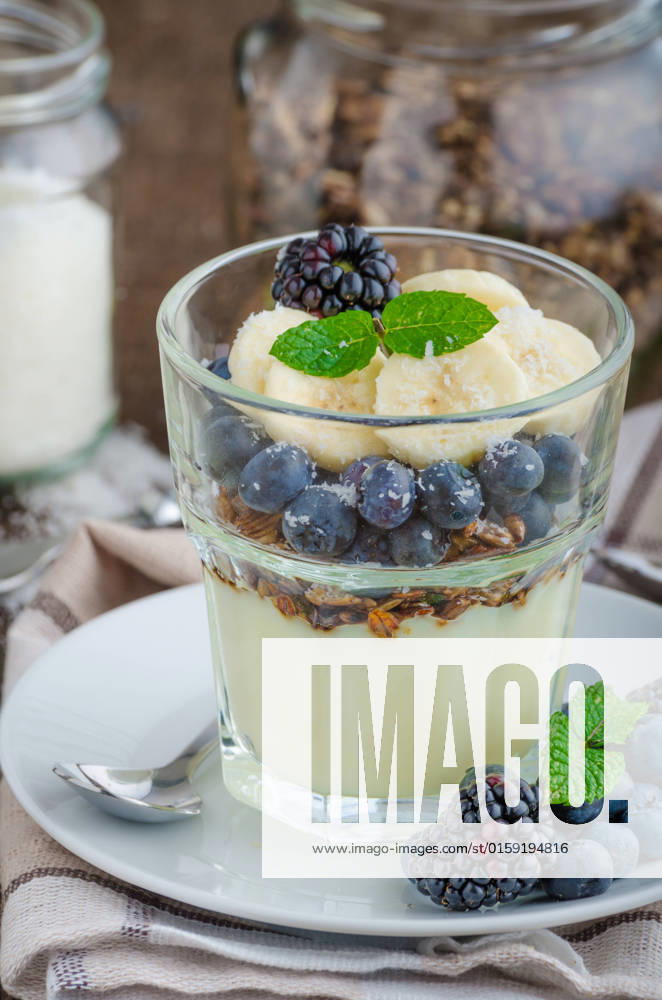 Vanilla pudding with berries and mint on wood desk , 22988378.jpg, pudding, chocolate, christmas, food, dessert, chia, cream, white, sweet, milk, mousse, bread, rice, bowl, background, whipped, delicious, cup, homemade, sugar, healthy, brown, glass, creamy, toffee, tasty, gourmet, spoon, fresh, sauce, fruit, raw, mint, vanilla, traditional, husk, breakfast, recipe, horizontal, meal, custard, berries, wood, dark, moody, bio, organic, collecting, forest, vanilla,