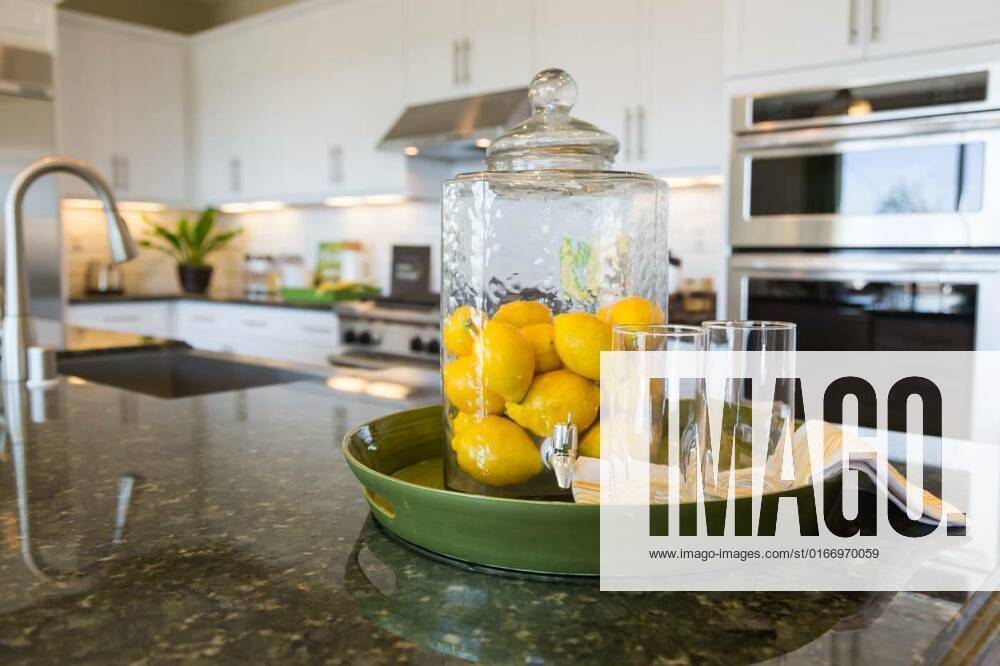 Abstract of Interior Kitchen Counter with Lemon Filled Pitcher and Drinking Glasses, Abstract of Interior Kitchen Counter with Lemon Filled Pitcher and Drinking Glasses., 02.06.2021,