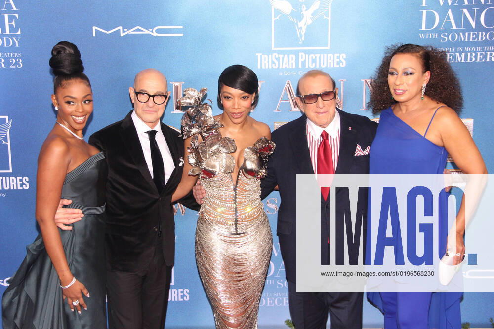 NEW YORK, NY- DECEMBER 13: Nafessa Williams, Stanley Tucci, Naomi Ackie, Clive Davis and Tamara Tunie at the New York City world premiere of Tristar s Whitney Houston: I Wanna Dance With Somebody at AMC Lincoln Square in New York City on December 13, 2022.