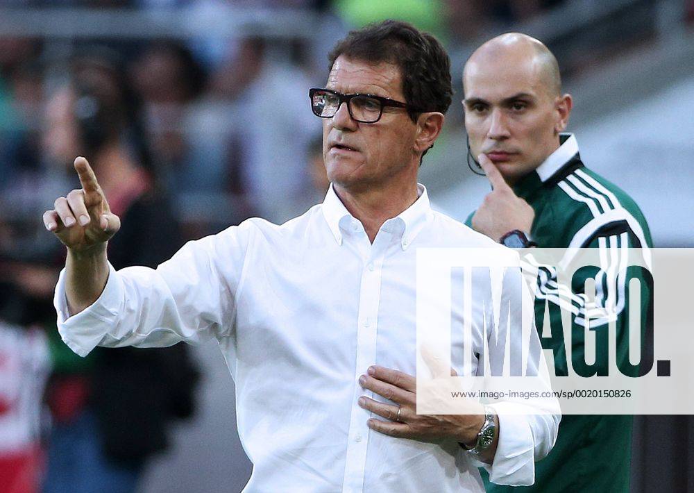MOSCOW, RUSSIA. JUNE 14, 2015. Russian national football team head coach Fabio Capello (L) seen in the 2016 UEFA European Championship EM Europameisterschaft Qualifying Round Group G football match against Austria at the Otkrytie Arena Stadium. The Austrian team won the game 1:0. Valery Sharifulin TASS TS005CC8