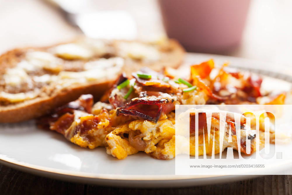 Closeup of scrambled eggs with bacon