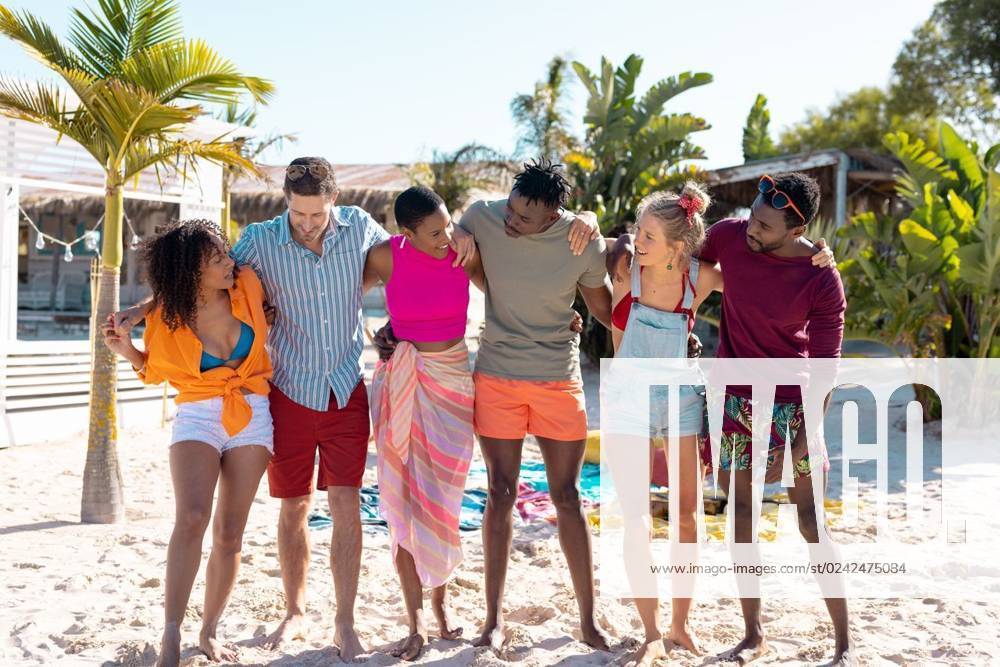 Happy diverse friends embracing at beach Happy diverse friends embracing at beach. Spending quality time, lifestyle, friendship, summertime and vacation concept., model released, , property released, Cape Town, South Africa, 21.02.2023, 3976665.jpg, people,happy,diverse,friend,embracing,beach,spending,quality time,lifestyle,friendship,party,summertime,vacation,concept,young,sea,ocean,fun,holiday,leisure,summer,person,coast,happiness,together,beautiful,sand,travel,adult,smile,cheerful,water,outdoor,quality,time Young Adult,Woman,Female,White,Black,Mid Adult,Man,Male