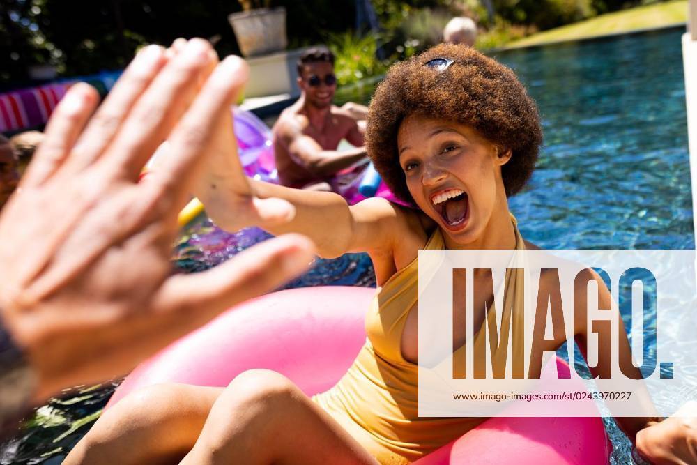 Happy diverse group of friends having pool party, using swim rings in swimming pool in garden Happy diverse group of friends having pool party, using swim rings in swimming pool in garden. Lifestyle, friendship, party and summer., model released, , property released, Cape Town, South Africa, 2023-01-25T22:00:00.000Z, 4017958.jpg, people,happy,diverse group,friend,pool party,using,swim ring,swimming pool,garden,lifestyle,friendship,summer,young,beautiful,nature,person,fun,outdoor,adult,leisure,smile,spring,happiness,cheerful,beauty,portrait,green,together,cute,plant,smiling,diverse,group,pool,party,swim,ring,swimming Young Adult,Man,Male,Multiracial,White,Woman,Female,Hispanic or Latino,Non-binary