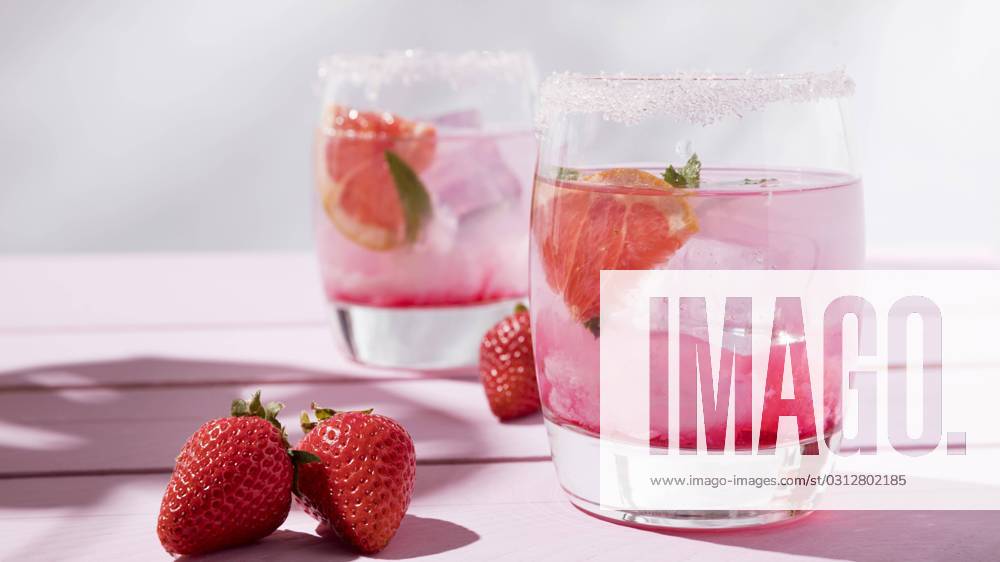 Glass with cold Strawberry flavor Drink