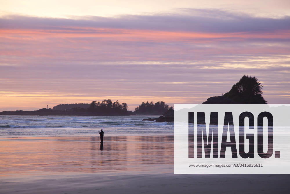 Cox Bay and Sunset Point at sunset near Tofino, British Columbia, Canada on Vancouver Island in Clayoquot Sound UNESCO Biosphere Reserve.
