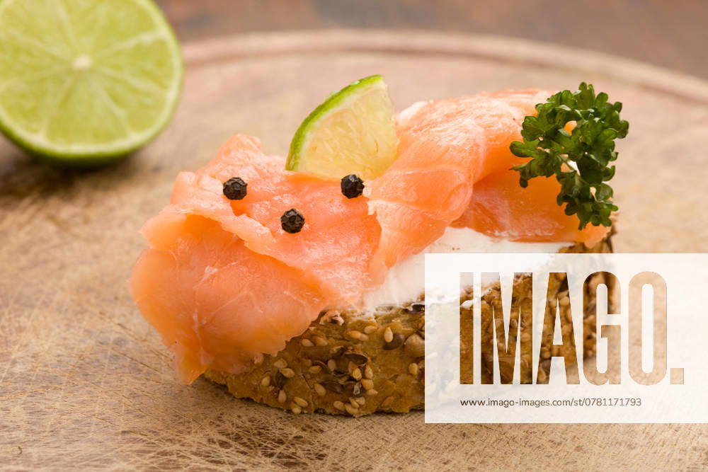 Photo of delicious crispy cereals bread with smoked salmon , 2186947.jpg, appetizer, black pepper, bread, Canapï¿½, cereals, chopping parsley, cream, cream, creme fraiche, crispy, dairy products, eat light food, fish, food, hors d oeuvre, lime, onions, salmon, sandwiches, slice of cheese, smoked, snacks, spreads, tomatoes, wheat, RECORD DATE NOT STATED