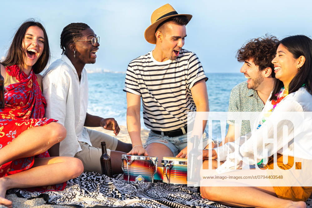 Group of multiracial friends having fun at the beach, laughing out loud, playing bongos and drinking beer together. Vacation and friendship concept., model released, , 47603782.jpg, beach, friends beer, picnic, party, toast, cheers, people, drink, african, black, bottle, having fun, sun, summer, group, hold, men, happy, festival, guy, travel, young, hispanic, hat, holidays, latina, sea, youth, fun, music, celebration, joy, alcohol, friendship, women, cool, weekend, beautiful, sand, female, outdoor, holiday, hangout, sitting, freedom, vacation, copy space RECORD DATE NOT STATED