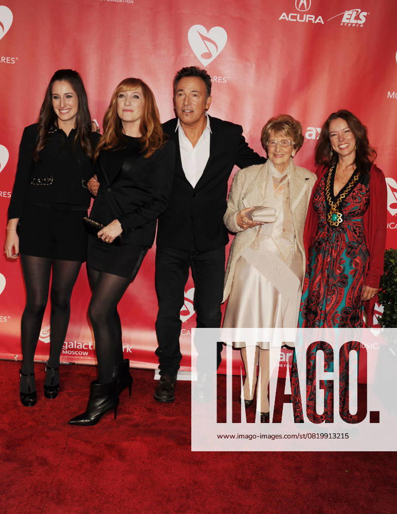 2013 MusiCares Person Of The Year Jessica Rae Springsteen, Patti Scialfa, Bruce Springsteen, Adele Springsteen and Pamela Springsteen At the 2013 MusiCares Person Of The Year at Los Angeles Convention Center in Los Angeles, California, USA, 8th February 2013. full length suit jacket tights jeans denim red pattern family married husband wife black suit white shirt dress CAP ROT TM TM ROT Los Angeles California USA