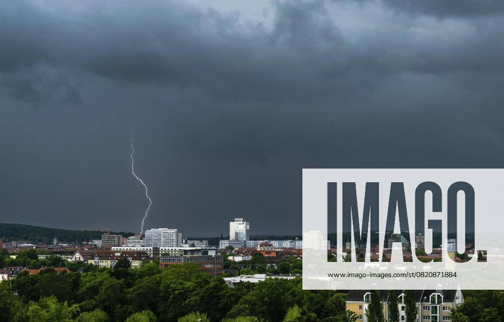 THUNDERSTORMS OVER THURINGIA 28 05 2025 Söllnitz A thunderstorm front with heavy rain moves over Thuringia in the afternoon, as seen here over the state capital Erfurt Germany Thuringia Erfurt Copyright SaschaxFromm