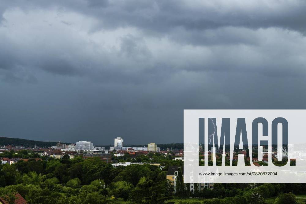 THUNDERSTORMS OVER THURINGIA 28 05 2025 Söllnitz A thunderstorm front with heavy rain moves over Thuringia in the afternoon, as seen here over the state capital Erfurt Germany Thuringia Erfurt Copyright SaschaxFromm