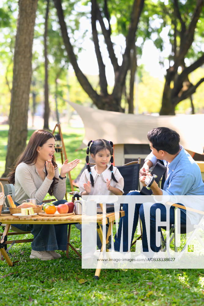 Parents and daughter camping in a forest park surrounded by nature and fresh food Parents and daughter camping in a forest park surrounded by nature and fresh food., model released, , 96802098.jpg RECORD DATE NOT STATED