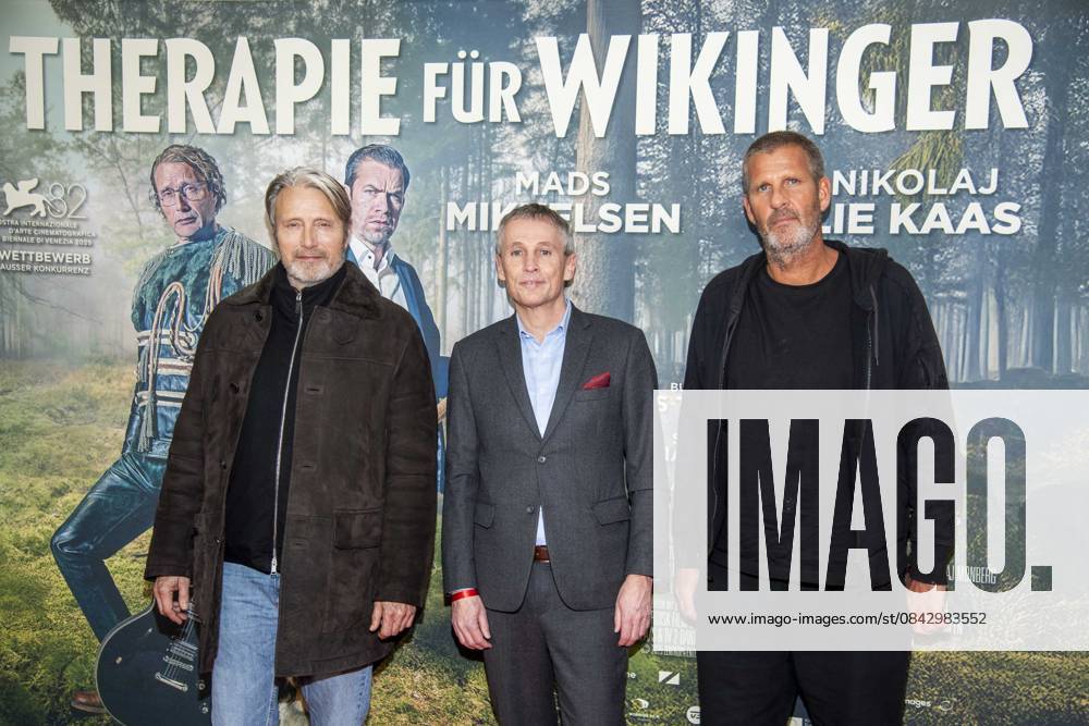Abb Mads Mikkelsen, Thomas Ostrup Moller Danish Ambassador and Anders Thomas Jensen on the red carpet at the Berlin movie premiere of Therapy for Vikings at the Delphi Filmpalast Berlin cinema on 17 12 2025 Berlin Germany