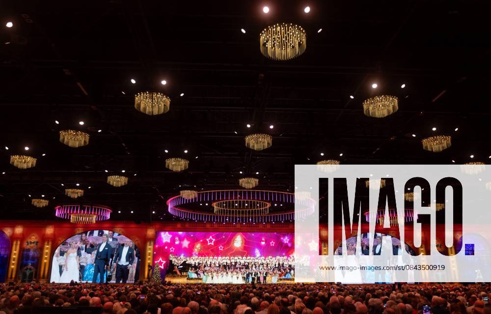 MAASTRICHT Violinist and conductor Andre Rieu and Emma Kok perform the last of his six Christmas concerts at the MECC. Rieu is accompanied by his Johann Strauss Orchestra, soloists, dancers, and skaters. ANP IRIS VAN DEN BROEK netherlands out - belgium out