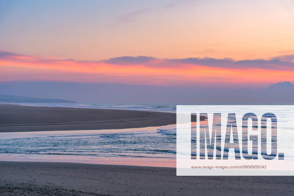 Scenic beach at sunset showing the Morocco coastline Asilah, Tangier-Tétouan-Al Hoceima, Morocco CR_UGOUSD260516-2022366-01