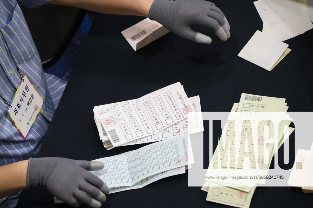 Ballots are sprawled across a tabletop as poll workers count them after the conclusion of voting in South Koreaâ€⠢s local elections on Wednesday, June 3, 2026 in Seoul, South Korea. Seoul South Korea - ZUMAh163 20260603_znp_h163_027