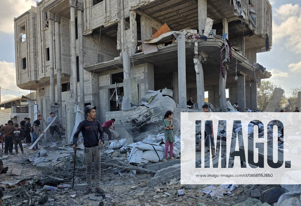 Palestinians Inspect Destruction After Strike on Displacement Area Palestinians inspect the destruction caused by an Israeli airstrike that targeted tents and shelters for displaced people in the Mawasi area of Khan Younis, southern Gaza Strip, on June 7, 2026. Debris and personal belongings were scattered across the sandy area as residents searched through the wreckage of their damaged shelters. Photo by Tariq Mohammad APA Images Khan Yunis Gaza Strip Palestinian Territory 070626_Khan_Yunis_TM_00(62)