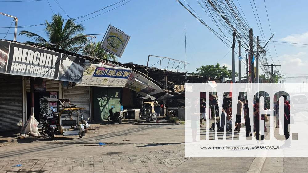 (260608) -- MANILA, June 8, 2026 -- This photo taken on June 8, 2026 shows damaged shops after a 7.8 magnitude earthquake, in General Santos City, the Philippines. At least five people have been reported dead after a 7.8-magnitude offshore earthquake that hit the southern Philippines, according to a local disaster official. The Philippine Institute of Volcanology and Seismology said the tectonic earthquake occurred at 7:37 a.m. local time at a depth of 33 km, with the epicenter 32 km southwest of the coast of Maasim town in Sarangani Province on Mindanao Island, close to General Santos, with a population of some 700,000. The institute said the highest wave recorded reached 1.4 meters. (SpotNews) PHILIPPINES-GENERAL SANTOS CITY-EARTHQU