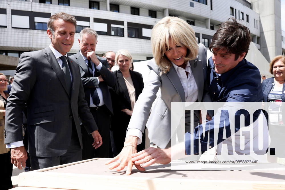 Emmanuel Macron and Brigitte Macron Visit the Robert-Debre Hospital - Paris French President Emmanuel Macron and his wife Brigitte Macron attend a handprint event during the foundation stone laying ceremony for the Child Brain Institute (ICE - Institut Robert-Debre du Cerveau de l’Enfant) at the Robert-Debre Hospital in Paris on June 10, 2026. Photo by Stephane Lemouton Pool ABACAPRESS.COM Paris France