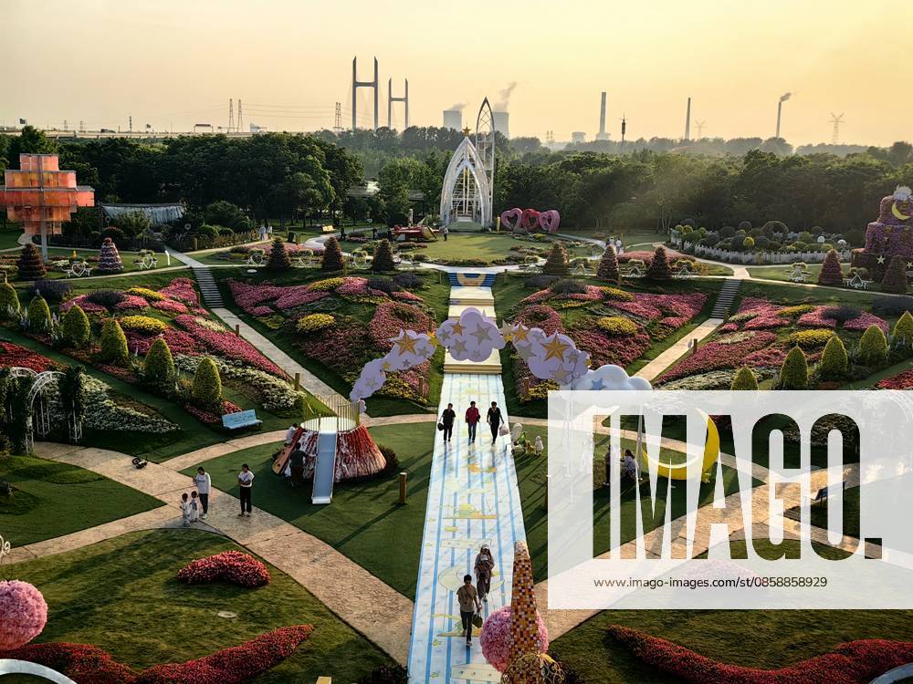 Visitors enjoy the scenery at the Miracle Garden in Pujiang Country Park on June 10, 2026 in Shanghai, China. The park has opened the area to the public free of charge.