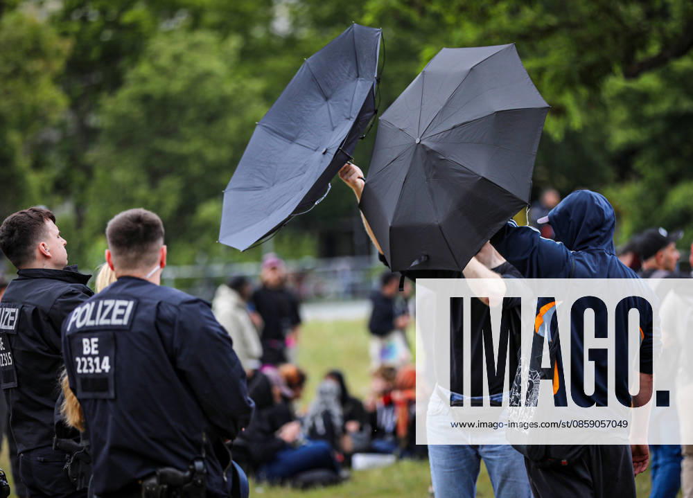 Demonstrators march through the streets of Berlin, Germany, protesting against the expansion of police surveillance technologies, biometric monitoring systems, facial recognition tools, and the use of artificial intelligence in law enforcement on June 13, 2026. Participants carried banners, flags, umbrellas, and symbolic props, including representations of surveillance cameras, while voicing concerns over privacy rights, state monitoring, and civil liberties. The demonstration was monitored by Berlin police as protesters gathered at several locations across the city demanding greater protections against digital surveillance and data collection. Berlin Germany - ZUMAa268 20260613_zip_a268_013