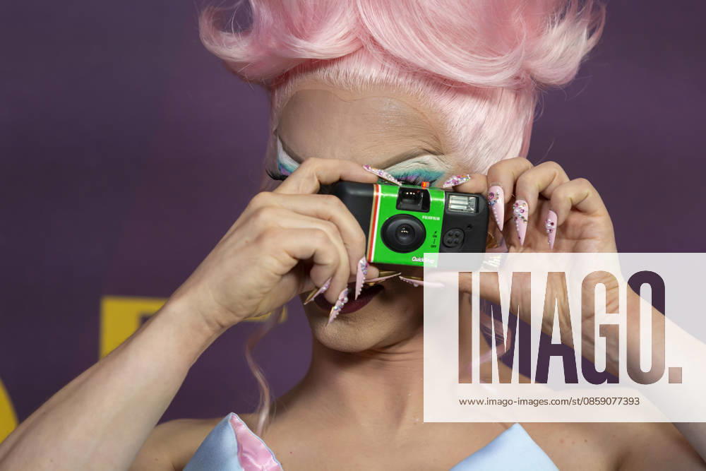 MIZ CRACKER takes a photograph of the photographers on the red carpet during the Pride Gala at the Sanctuary in Seattle on Saturday, June 13. 2026. The inaugural celebration benefits LifelongÃ¢â‚¬â ¢s programs providing food and nutrition, aging and disability, housing, and HIV care prevention for communities facing barriers. Seattle USA - ZUMAg235 20260613_zap_g235_010