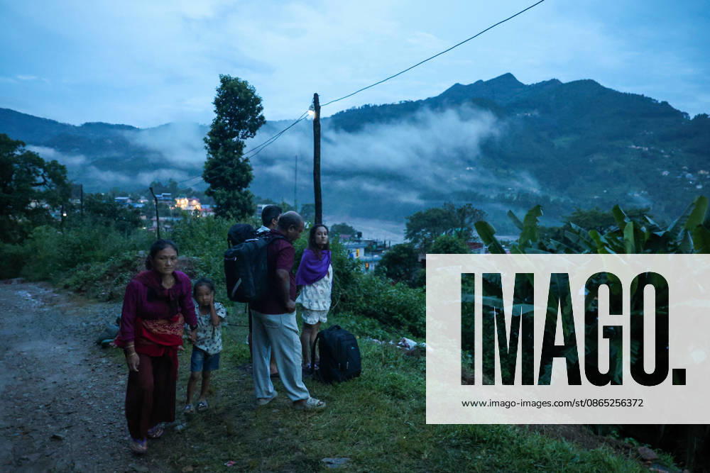 People in Nepal flee homes amid flash flood warning BIDUR, NEPAL - AUGUST 30: Residents living along Trishuli River take shelter at higher ground after fleeing homes early in the morning, as authorities issue new flash flood warning, in Bidir, Nuwakot, Nepal, on August 30, 2026. More than 2,000 people remain missing while hundreds of people have died, following the flash flood and landslide near the Nepal-China border earlier. Among the missing foreign nationals include those from China, India, the United States, Australia, the United Kingdom and South Korea. Daniel Ceng Anadolu Bidur Nepal. Editorial use only. Please get in touch for any other usage.
