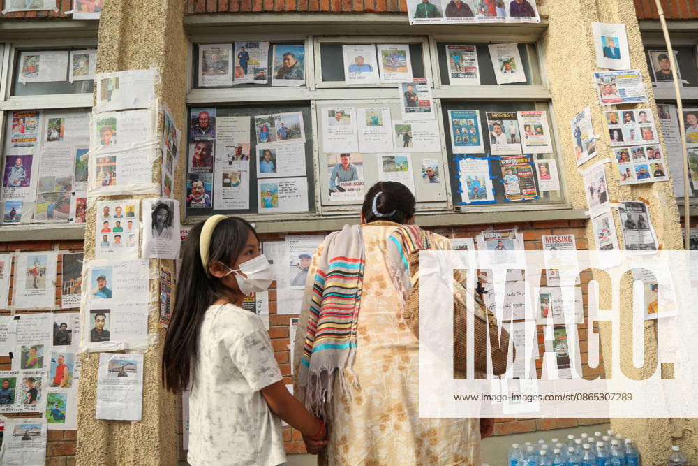 Families Search For Loved Ones After Nepal Floods - Kathmandu People look at a wall displaying photographs of people reported missing outside a hospital in Kathmandu, Nepal on August 30, 2026. Photo by Sunil Pradhan ABACAPRESS.COM Kathmandu Bagmati Nepal