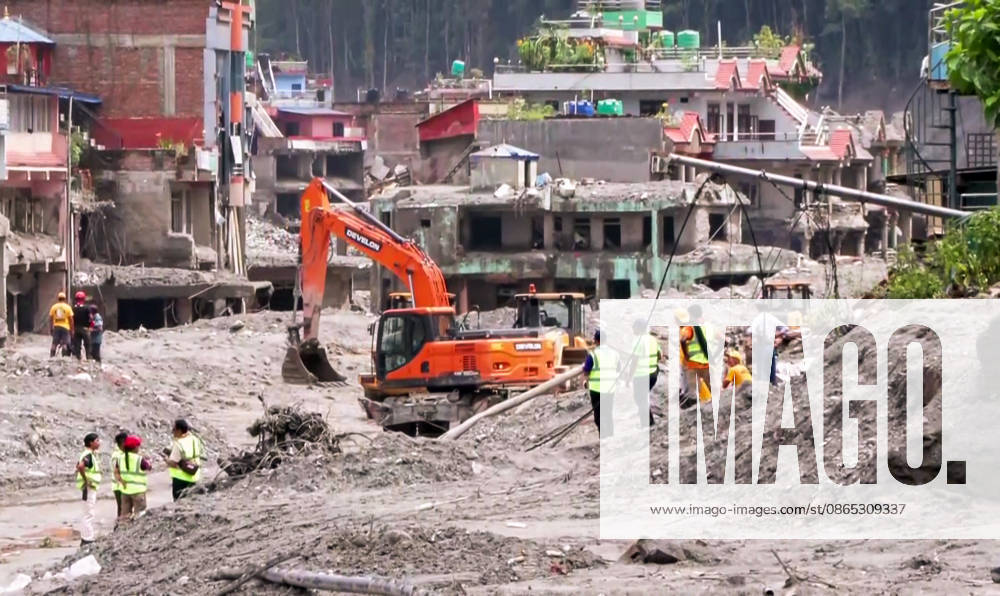 Debris Clearance Underway in Flood-Damaged Residential Area in Nuwakot Nuwakot Nepal , Aug 30 (ANI): Debris being cleared from a residential area damaged by a devastating flood, with heavy machinery including excavators and trucks deployed for ongoing cleanup operations at Trishuli, in Nuwakot on Sunday. (ANI Video Grab) Nuwakot Nepal