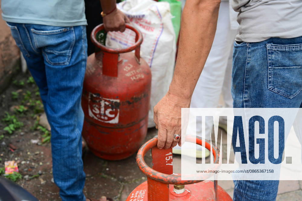 Customers wait in long queues to receive liquefied petroleum gas (LPG) cylinders in Kathmandu, Nepal, on August 31, 2026, as the devastating Rasuwa floods add further pressure to an already strained cooking gas distribution system. Nepal had already been facing long queues and difficulties obtaining LPG, with increased demand and distribution problems affecting consumers. The catastrophic flash floods that struck near the Nepal-China border on August 26 swept away homes, vehicles, roads, bridges and other infrastructure, while LPG cylinders were also carried away by the powerful floodwaters. Some people were seen entering the floodwaters and swimming to retrieve the cylinders. The disaster disrupt - ZUMAs330 20260831_zsp_s330_007