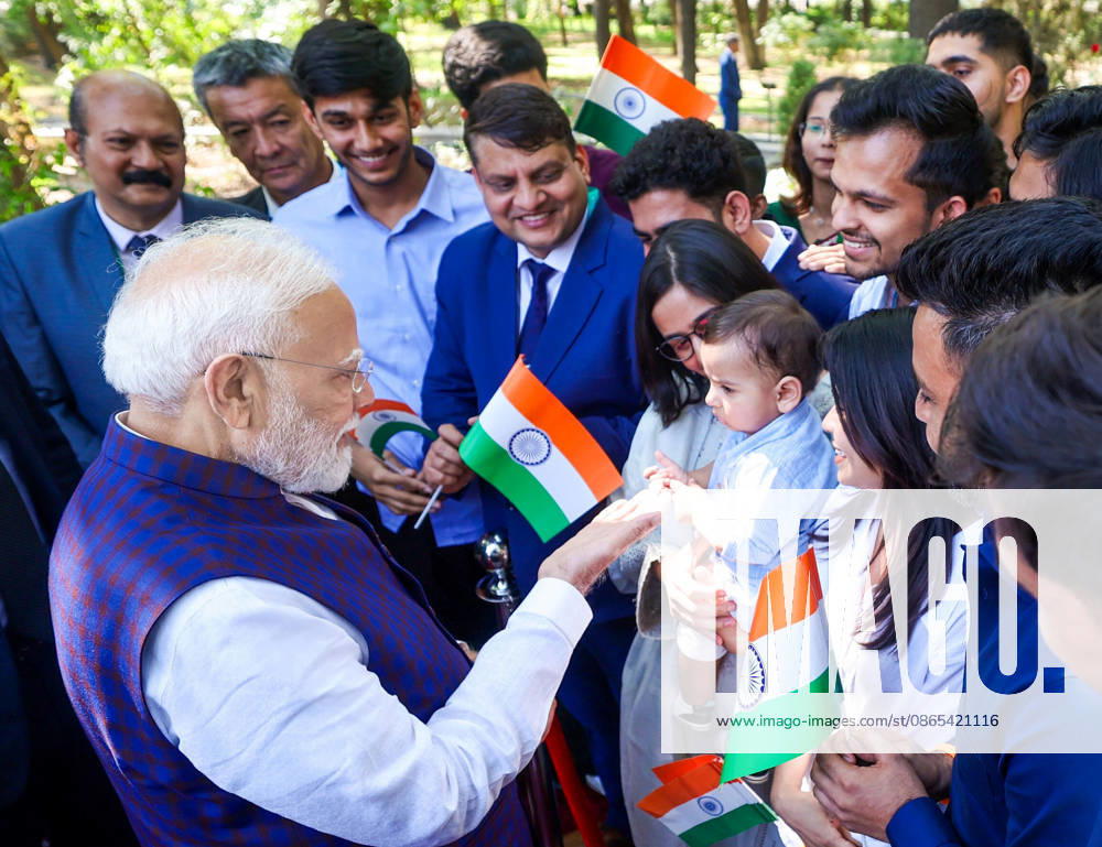 PM Modi Interacts with Child While Meeting Indian Diaspora in Bishkek Bishkek Kyrgyzstan , Aug 31 (ANI): Prime Minister Narendra Modi interacts with a child as he meets members of the Indian diaspora after paying tribute at the Mahatma Gandhi Memorial, in Bishkek on Monday. (Narendra Modi Photo Gallery ANI Photo) Bishkek Kyrgyzstan