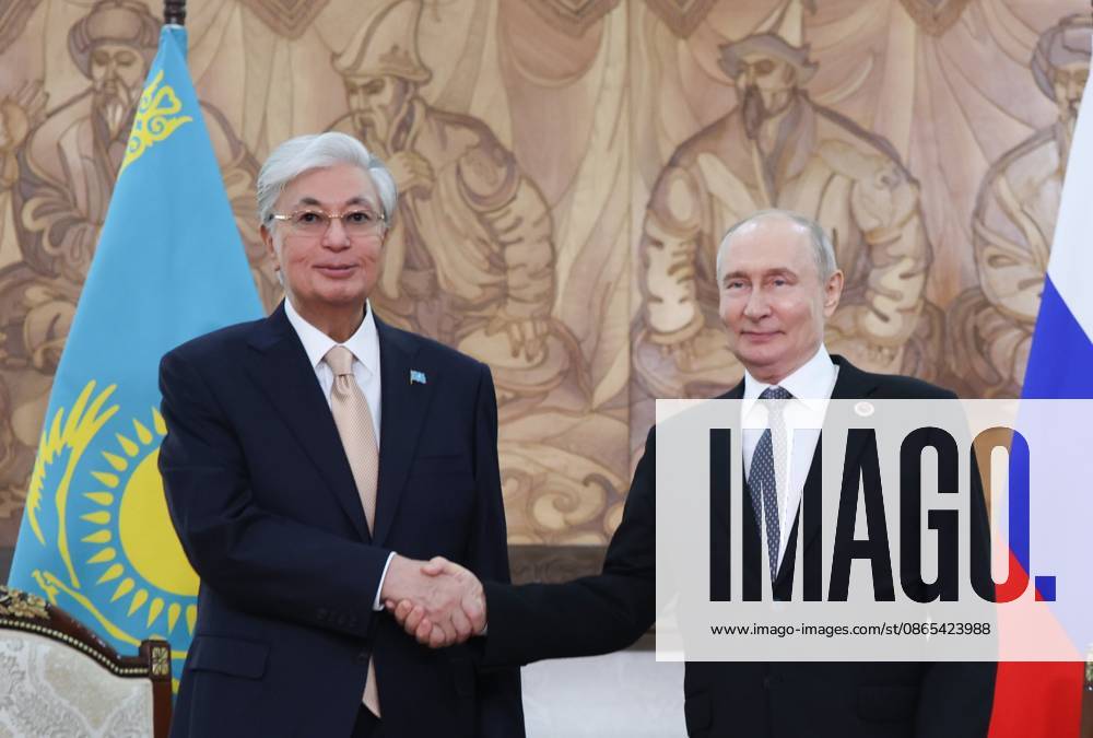 Kyrgyzstan Putin SCO Summit 9231966 31.08.2026 Kazakh President Kassym-Jomart Tokayev and Russian President Vladimir Putin shake hands as they pose for photos before a meeting on the sidelines of the Shanghai Cooperation Organization (SCO) summit in Bishkek, Kyrgyzstan. Petr Kovalev Sputnik Bishkek Kyrgyzstan