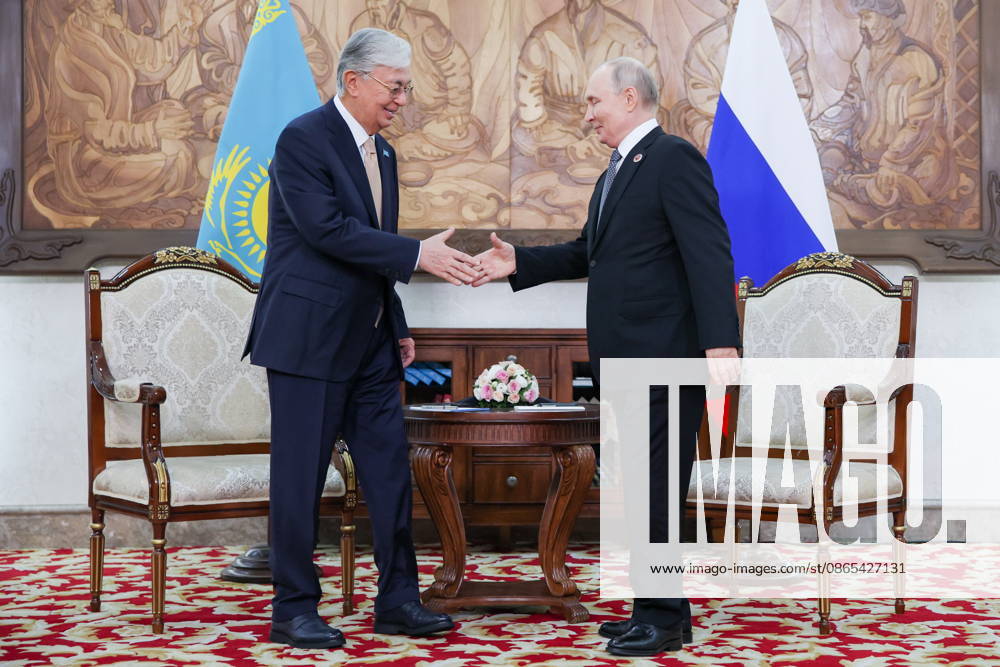 KYRGYZSTAN, BISHKEK - AUGUST 31, 2026: Kassym-Jomart Tokayev (L), President of Kazakhstan, and his counterpart Vladimir Putin of Russia shake hands during a meeting on the sidelines of the 2026 SCO Summit Bishkek Kyrgyzstan - ZUMAt113 20260831_zaa_t113_404