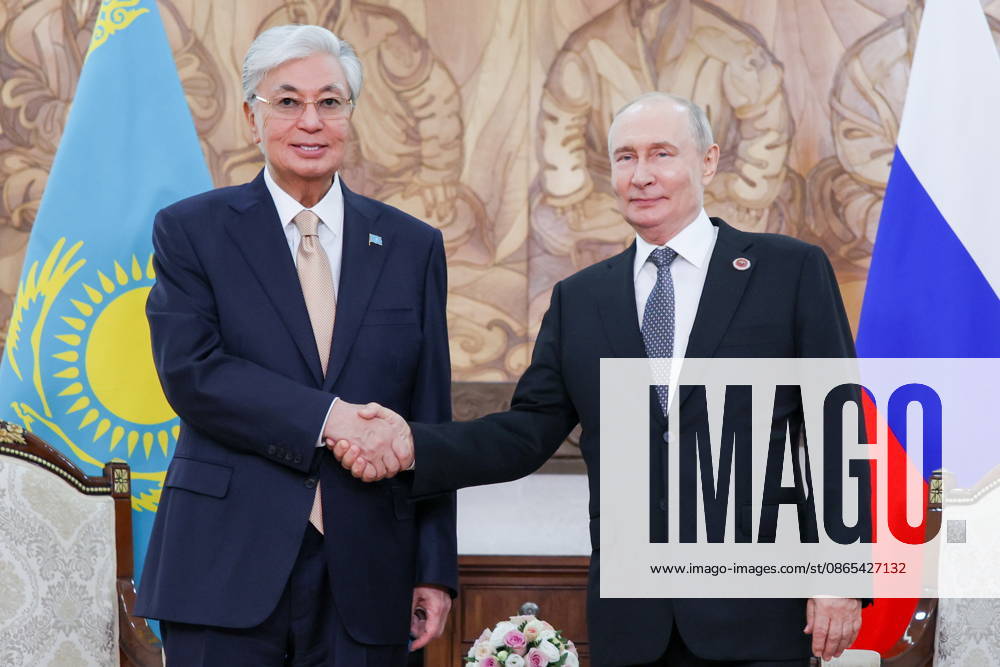 KYRGYZSTAN, BISHKEK - AUGUST 31, 2026: Kassym-Jomart Tokayev (L), President of Kazakhstan, and his counterpart Vladimir Putin of Russia shake hands during a meeting on the sidelines of the 2026 SCO Summit Bishkek Kyrgyzstan - ZUMAt113 20260831_zaa_t113_405