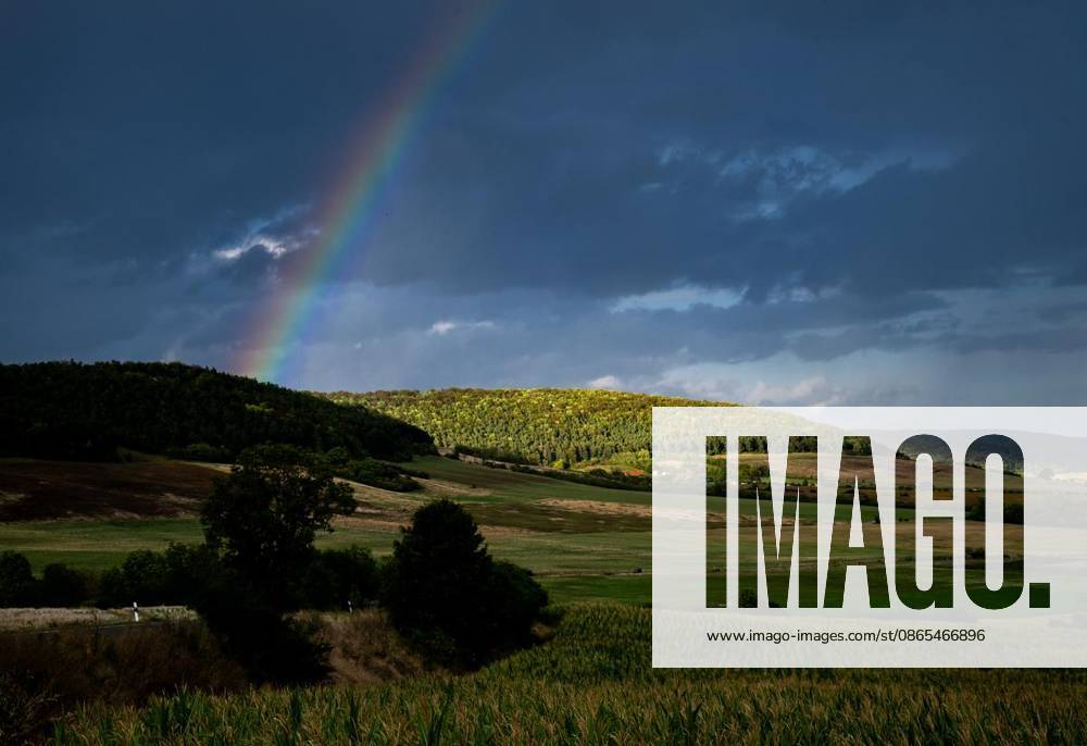 THUNDERSTORM OVER THURINGIA ** FOR **31 08 2026 Hohenfelden Part of a rainbow is visible in the evening sky over Hohenfelden, Weimarer Land, Germany, Thuringia, Hohenfelden. Copyright SaschaxFromm