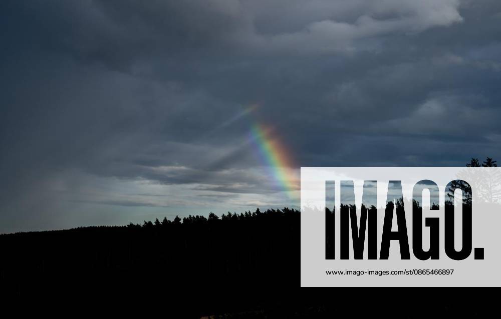 THUNDERSTORM OVER THURINGIA ** FOR **31 08 2026 Hohenfelden Part of a rainbow is visible in the evening sky over Hohenfelden, Weimarer Land, Germany, Thuringia, Hohenfelden. Copyright SaschaxFromm