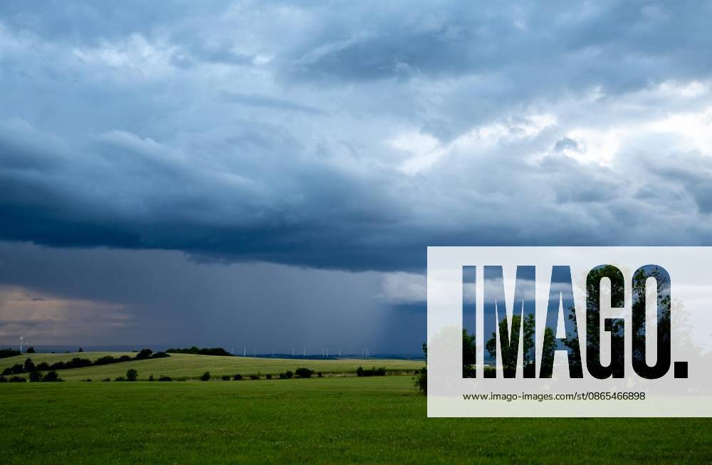 THUNDERSTORMS OVER THURINGIA ** ** ** Aug. 31, 2026, Gügleben A heavy rain shower passes over Thuringia in the evening, as photographed here near Erfurt. Germany, Thuringia, Gügleben. Copyright SaschaxFromm