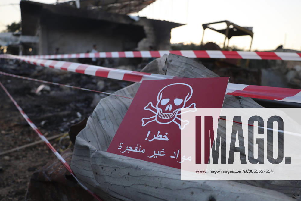 Binnish Syria Ammunition Explosion A warning sign is seen at the site of an explosion in Binnish, Idlib Governorate, Syria, on September 1, 2026. Five people were killed and several others injured when a vehicle loaded with ammunition exploded in Binnish, according to Syrian authorities, while the cause remained unclear and emergency crews worked to secure scattered munitions and prevent further explosions. Binnish Idlib Syria
