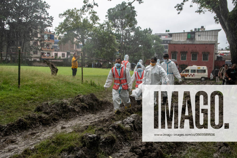 Bodies of unidentified victims wrapped in shrouds lie at a temporary burial trench in Gokarna, Kathmandu. Emergency teams collected DNA samples and forensic records prior to interment to assist family identification efforts later. Kathmandu Nepal - ZUMAs197 20260901_aaa_s197_247